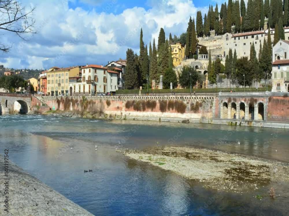 Time Lapse of the city of Verona with the clouds, with its river, the Roman bridge and the Roman theater; Italy Time Lapse of the city of Verona with the clouds, with its river, the Roman bridge and the Roman theater; Italy