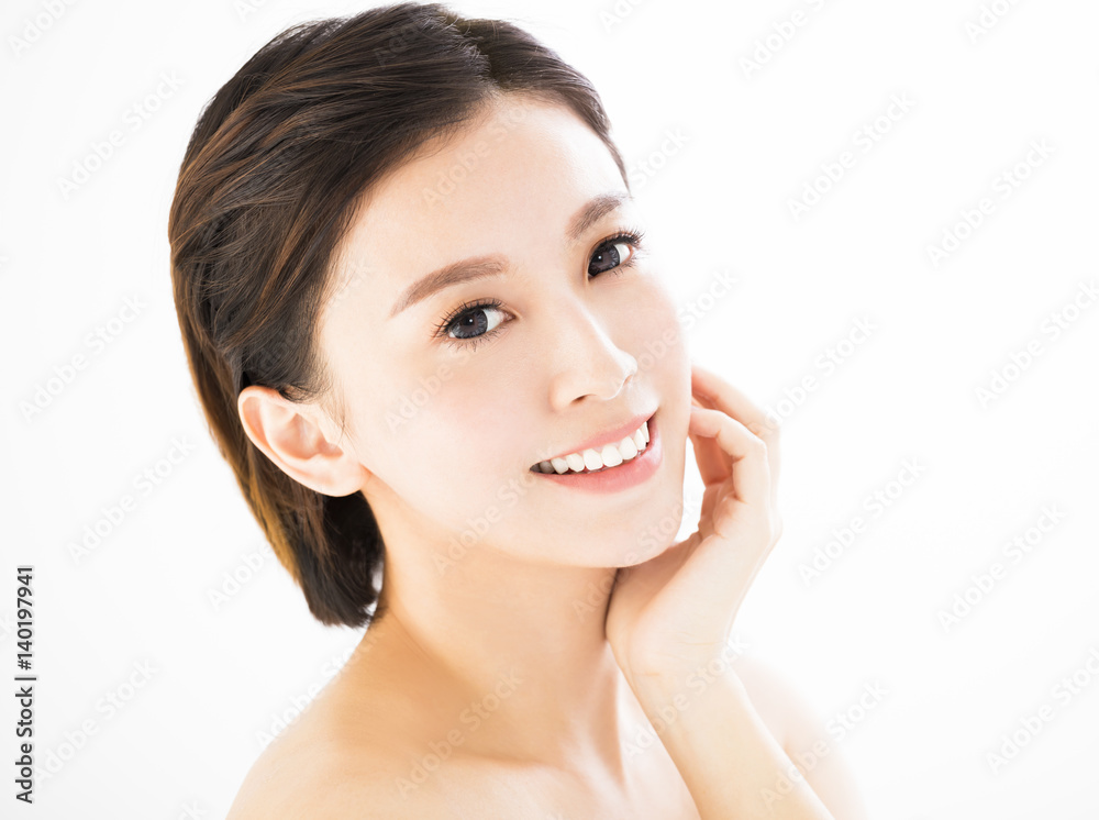 closeup   young  smiling woman face isolated on white