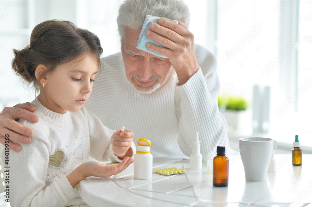 Granddaughter takes care of a sick grandfather Granddaughter takes care of a sick grandfather