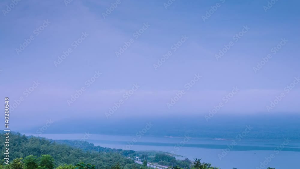 Awesome dynamic time lapse of fog drifting over the mountain lake at Lam Ta Khong Reservoir, Nakhon Ratchasima province, Thailand. Awesome dynamic time lapse of fog drifting over the mountain lake at Lam Ta Khong Reservoir, Nakhon Ratchasima province, Thailand.