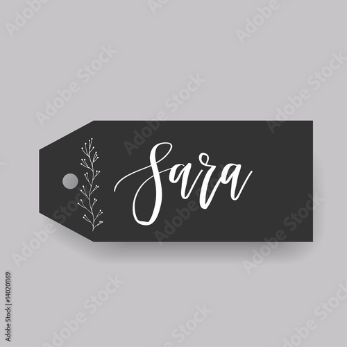 Common female first name Sara on a tag. Hand drawn calligraphy. Wedding typography element.