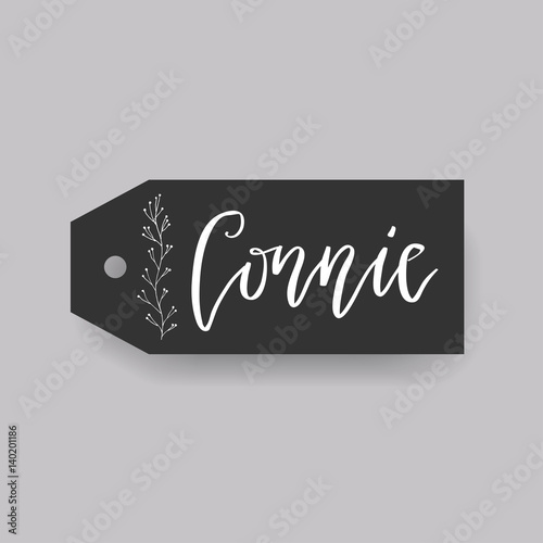 Common female first name Connie on a tag. Hand drawn calligraphy. Wedding typography element.