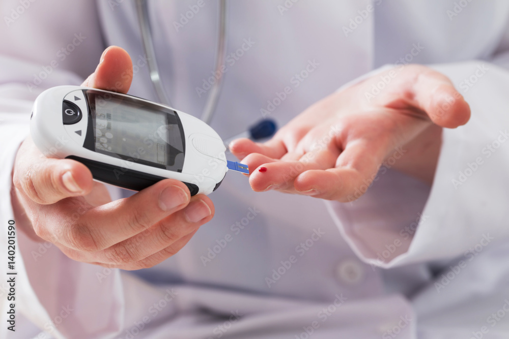 Fototapeta premium measuring blood sugar
