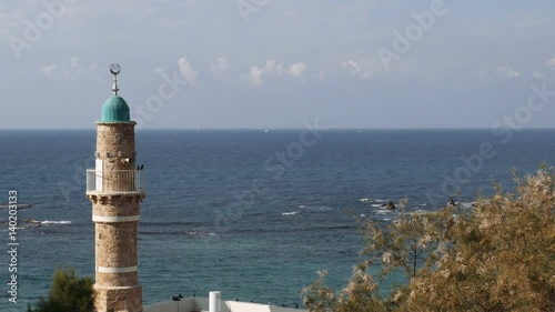 Minaret in the Old Jaffa on the background of the mediterranean sea, Tel Aviv, Israel.
