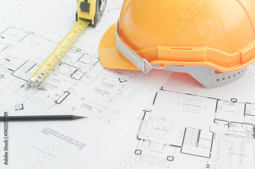 Architects workplace - architectural tools, blueprints, helmet, measuring tape, Construction concept. Engineering tools.