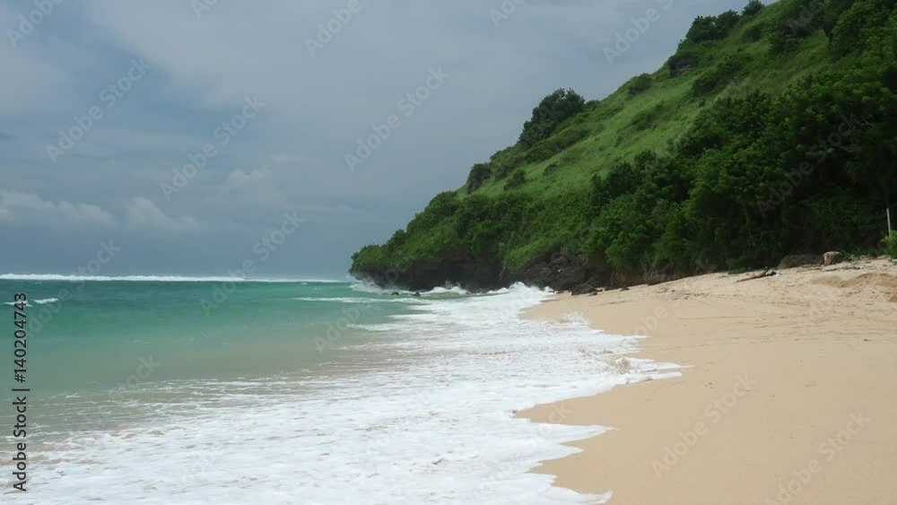 View on a Wild Beach Sand, Stones, Rocks, Trees, Clouds and Sea View on a Wild Beach Sand, Stones, Rocks, Trees, Clouds and Sea