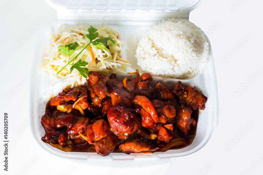 Vietnamese cuisine. meat, fried. packed in a box, disposable tableware. concept of fast food takeaway. Asian meat. Convenient but unhealthy polystyrene lunch boxes with take away meal on wooden table Vietnamese cuisine. meat, fried. packed in a box, disposable tableware. concept of fast food takeaway. Asian meat. Convenient but unhealthy polystyrene lunch boxes with take away meal on wooden table