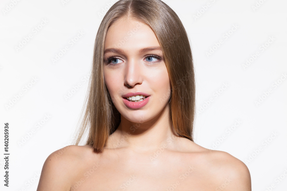 Blonde model woman with long hair on white background Blonde model woman with long hair on white background