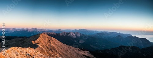 view from the top of Tahtalı Mountain Range during sunrise on sea and valley, Turkey, Kemer