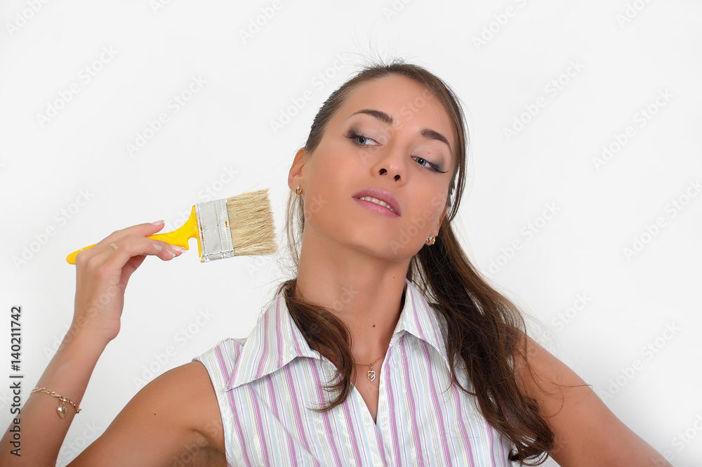 Girl with paint brush in hands Stock Photo Adobe Stock