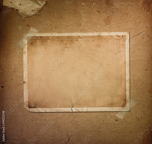 Old vintage album with paper frames for photos