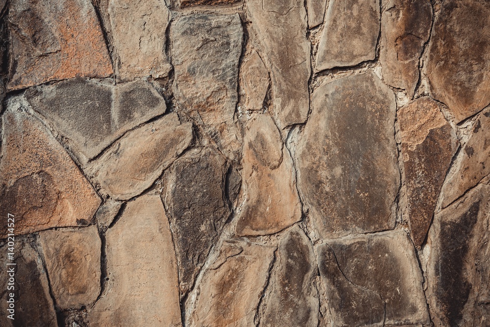 Stone wall. Outdoor background natural stone. Macro shot. Stone wall. Outdoor background natural stone. Macro shot.