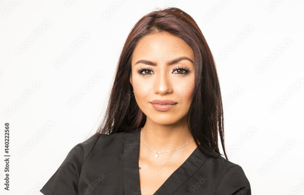 Attractive woman wearing scrubs for role in multiple career choices such as beautician or care giver. Attractive woman wearing scrubs for role in multiple career choices such as beautician or care giver.