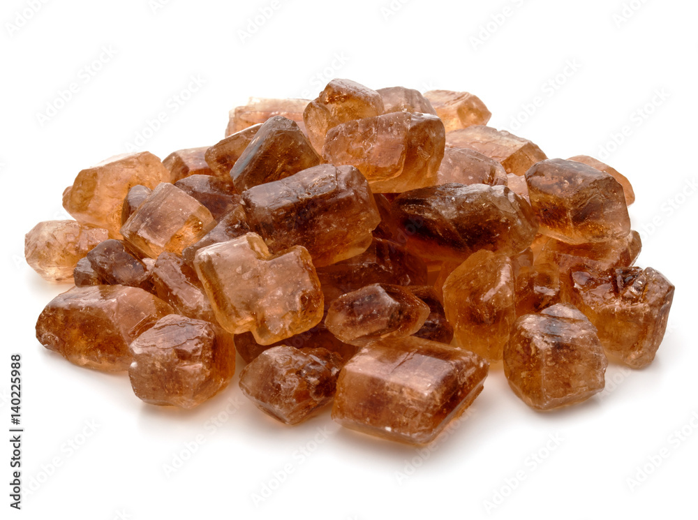 Brown caramelized lump cane sugar cube isolated on white background cutout