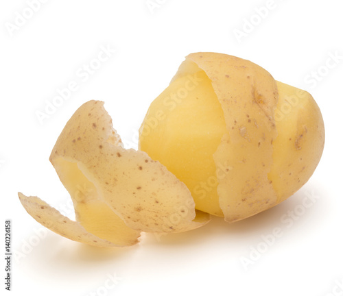 peeled potato tuber with peel spiral isolated on white background cutout