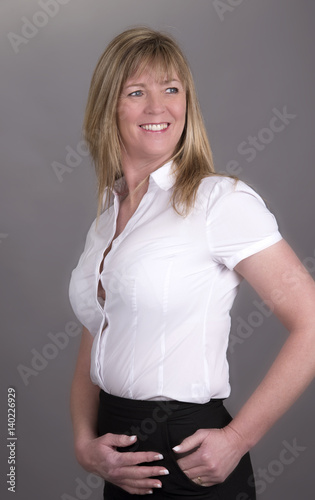 Woman wearing a tight fitting shirt