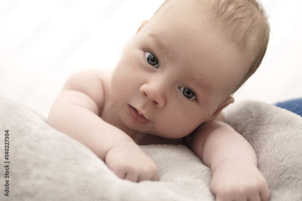 Newborn Baby Boy lying on a blanket Newborn Baby Boy lying on a blanket