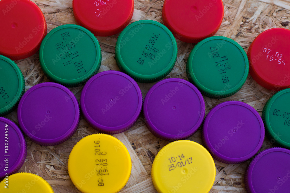 Semicircles of multicolored plastic closures Semicircles of multicolored plastic closures