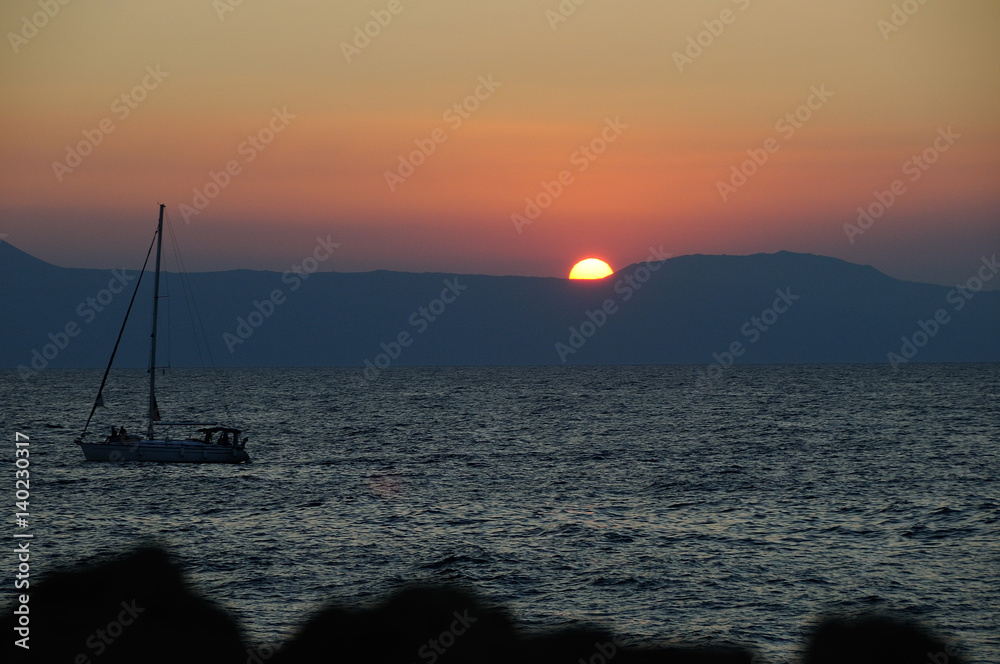 Sunset with a boat Sunset with a boat