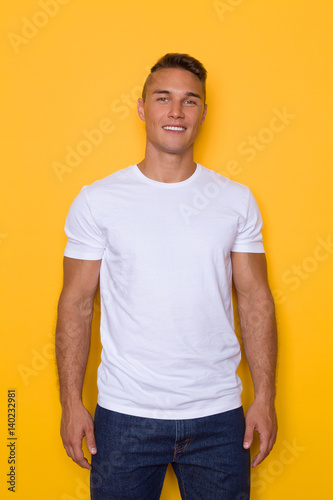 Young Handsome Smiling Man In White T-shirt