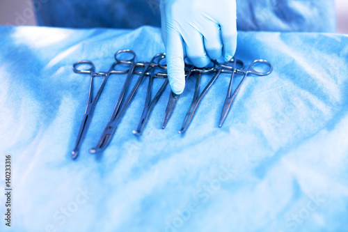 Surgical instruments lie on the table before surgery