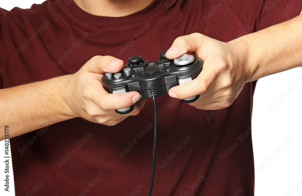 Teenager playing videogame on white background, closeup Teenager playing videogame on white background, closeup