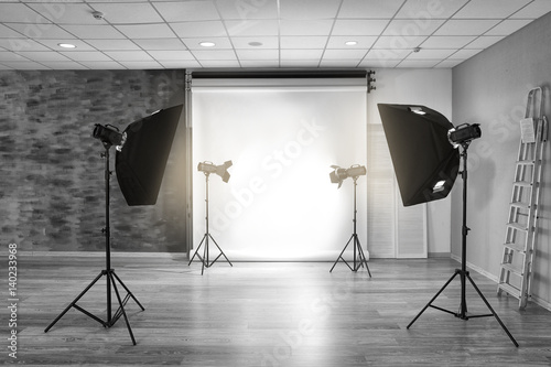 Empty photo studio with lig...