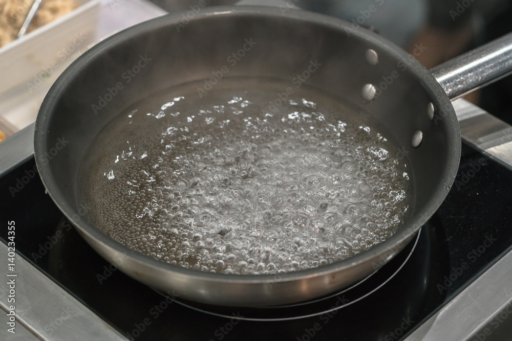 Boiling water in a pot Boiling water in a pot
