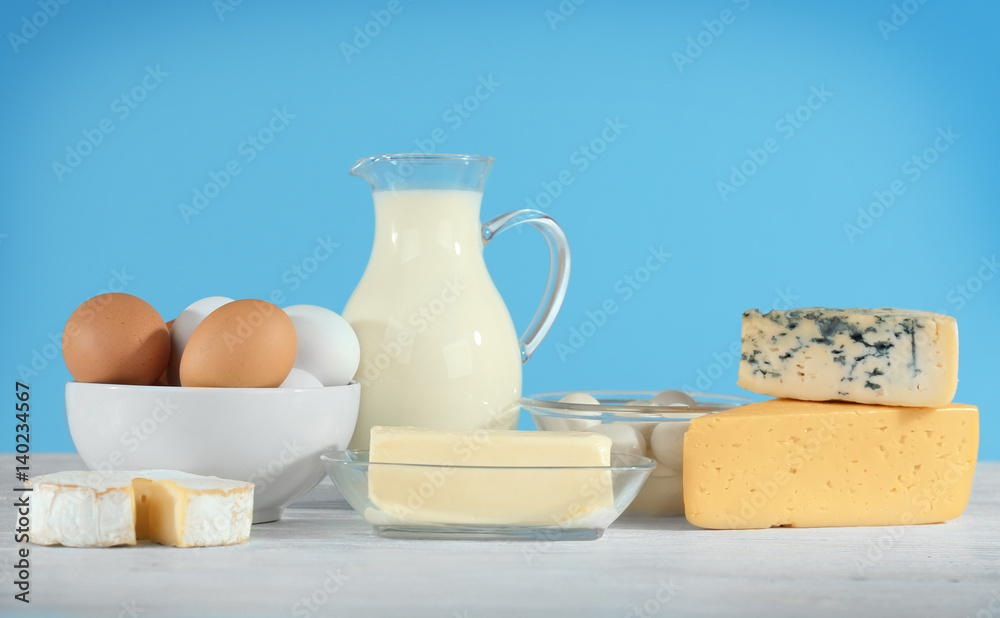 Different dairy products on wooden table Different dairy products on wooden table
