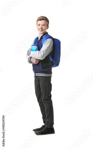 Teenage boy with backpack a...