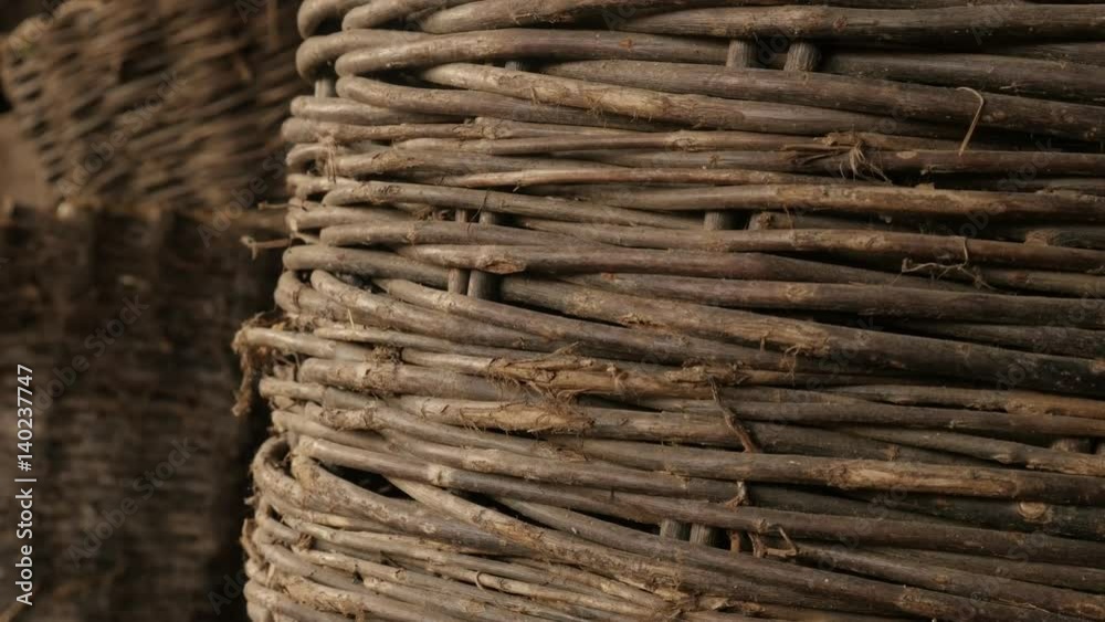 Slow tilt on old coiled container details and texture 4K 2160p 30fps UltraHD footage - Interwined ancient wicker basket shallow DOF 3840X2160 UHD video Slow tilt on old coiled container details and texture 4K 2160p 30fps UltraHD footage - Interwined ancient wicker basket shallow DOF 3840X2160 UHD video