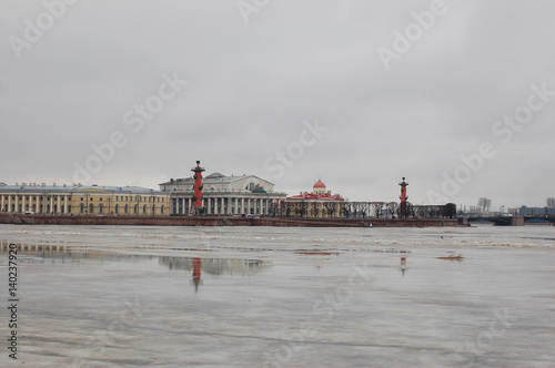 A harsh and majestic city. The beginning of spring in the city, cityscape, St. Petersburg. Reflections in the water. photo