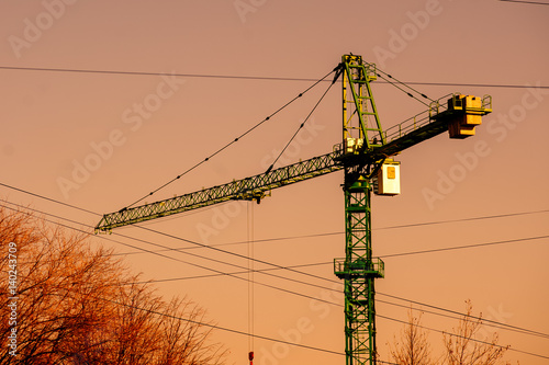 Silhouette of construction tower crane