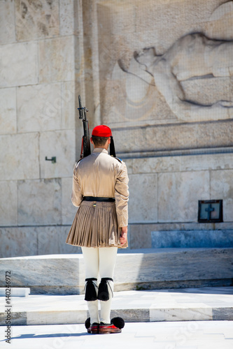 ATHENS, GREECE - JUNE 06, 2016: photo of evzone from the back  in front of the Tomb of the Unknown Soldier in Greece photo