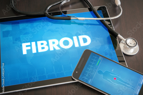 Fibroid (cancer related) diagnosis medical concept on tablet screen with stethoscope