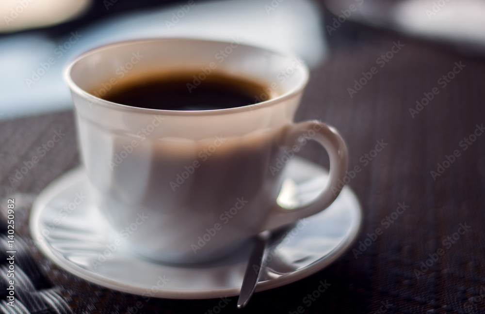 Cup of instant coffee on a table at restaurant