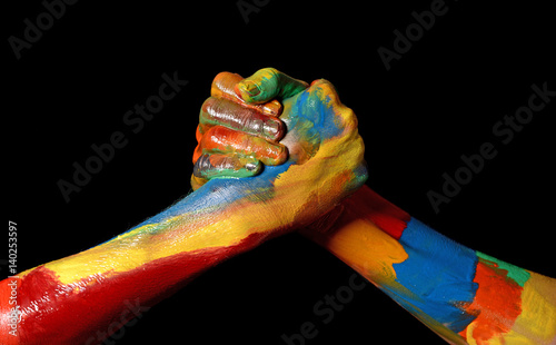 Two Friends Casual meeting painted hands diversty concept photo