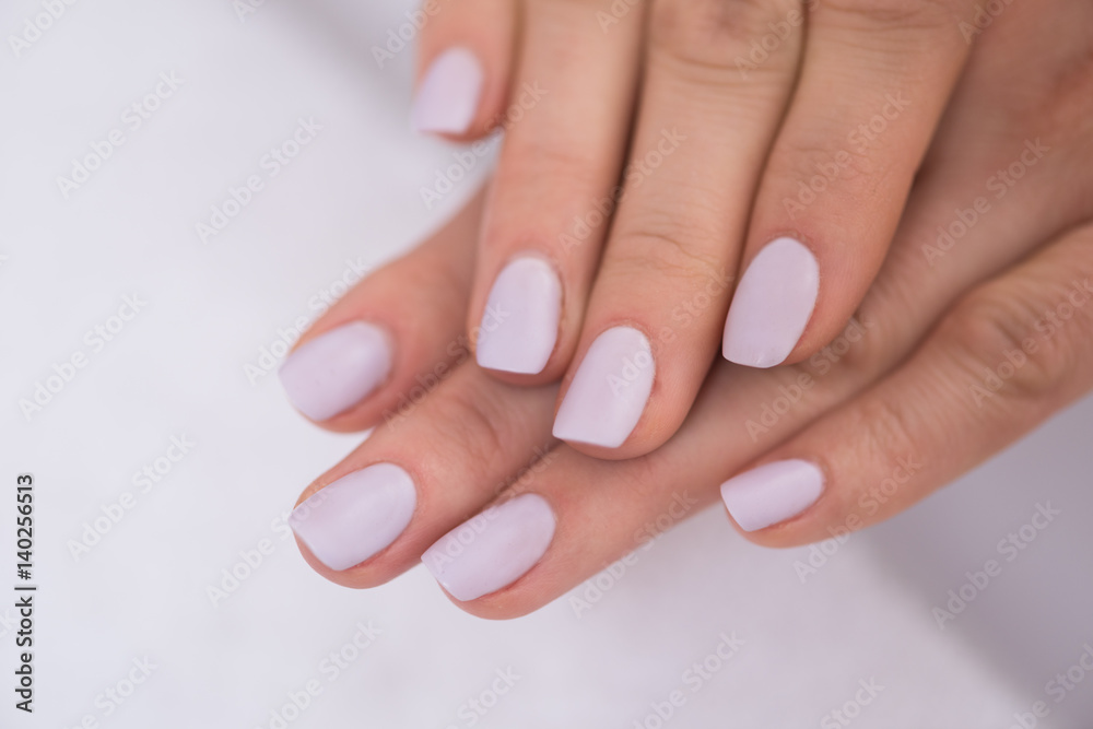 Fototapeta premium woman fingers with french manicure