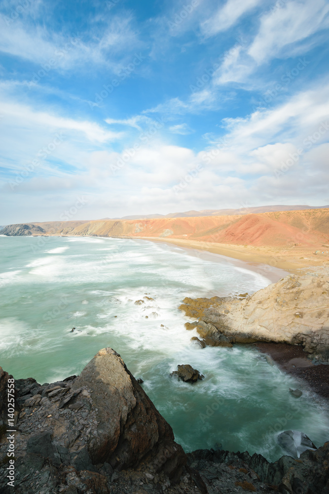 Rough colorful coastline, Atlantic, Morocco