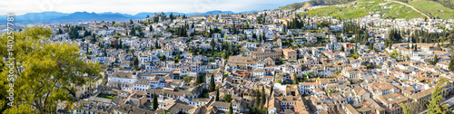 Panoramic landscape of Albaicín neighborhood in Granada. Typical Spanish village with white houses. 