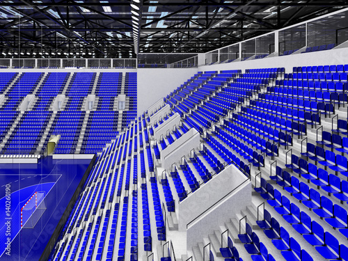 Bbeautiful sports arena for handball with blue seats and VIP boxes