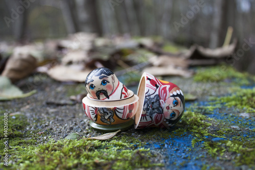 Matroyshka Doll Man Peeking Out From Woman photo