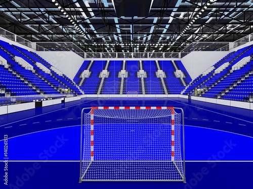 Beautiful sports arena for handball with blue seats and VIP boxes