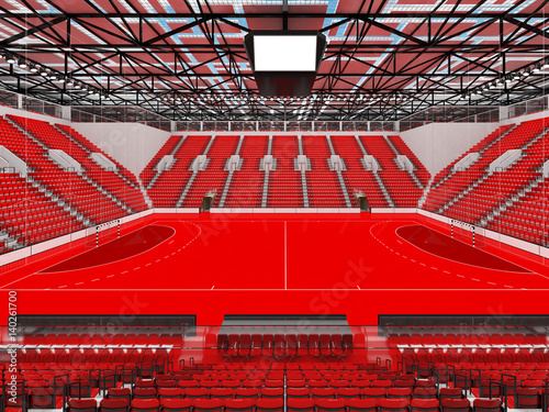 Beautiful sports arena for handball with red seats and VIP boxes