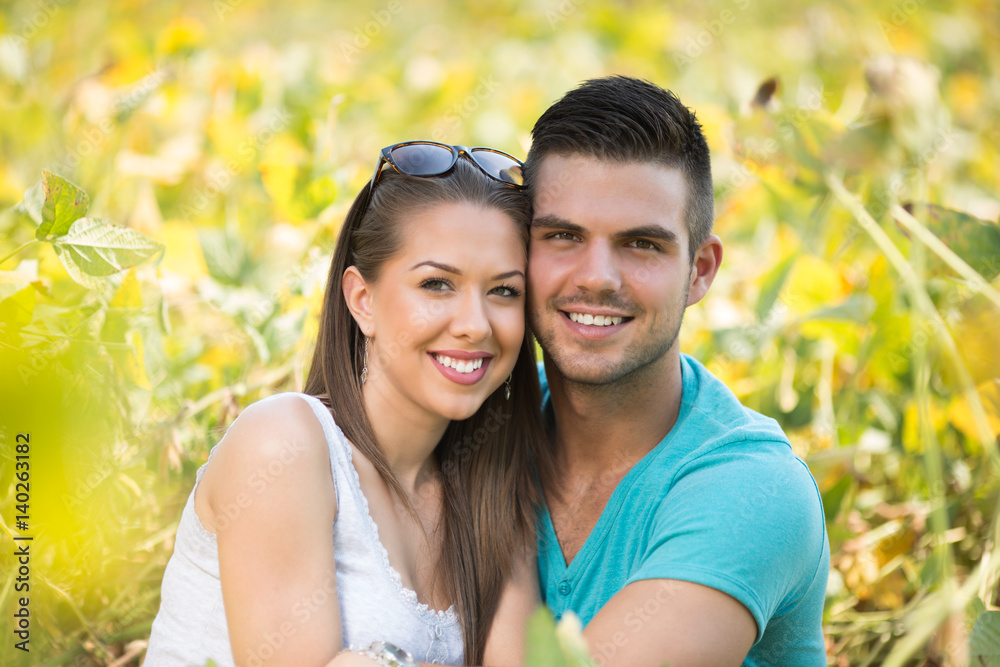 © BanjaninFoto - portrait of two young lovers in a field of soya beans
