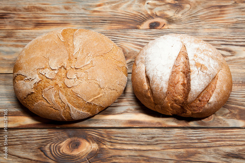 Bread on a rustic wooden background