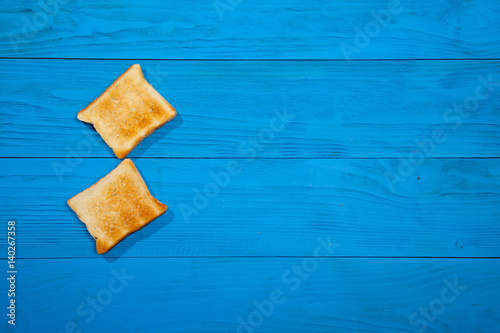 Toast on a wooden blue background