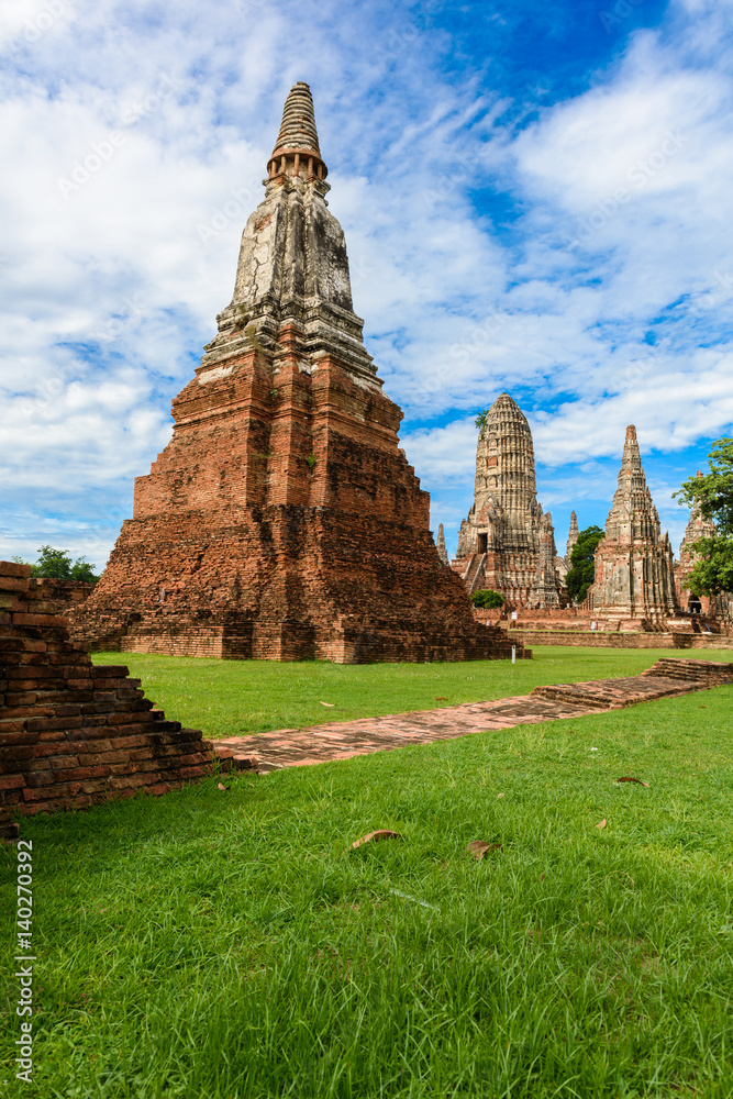 Majestic ruins of 1629 Wat Chai Watthanaram built by King Prasat Tong with its principal Prang (center) representing Mount Meru, the abode of the gods