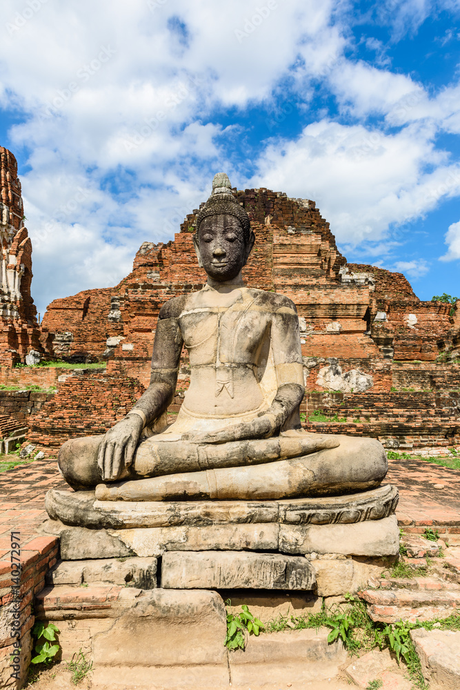 Fototapeta premium Buddha, a beautiful ancient site in Wat Maha That Ayutthaya as a world heritage site, Thailand