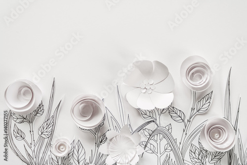3d paper flowers with painted leaves and stems on the white background